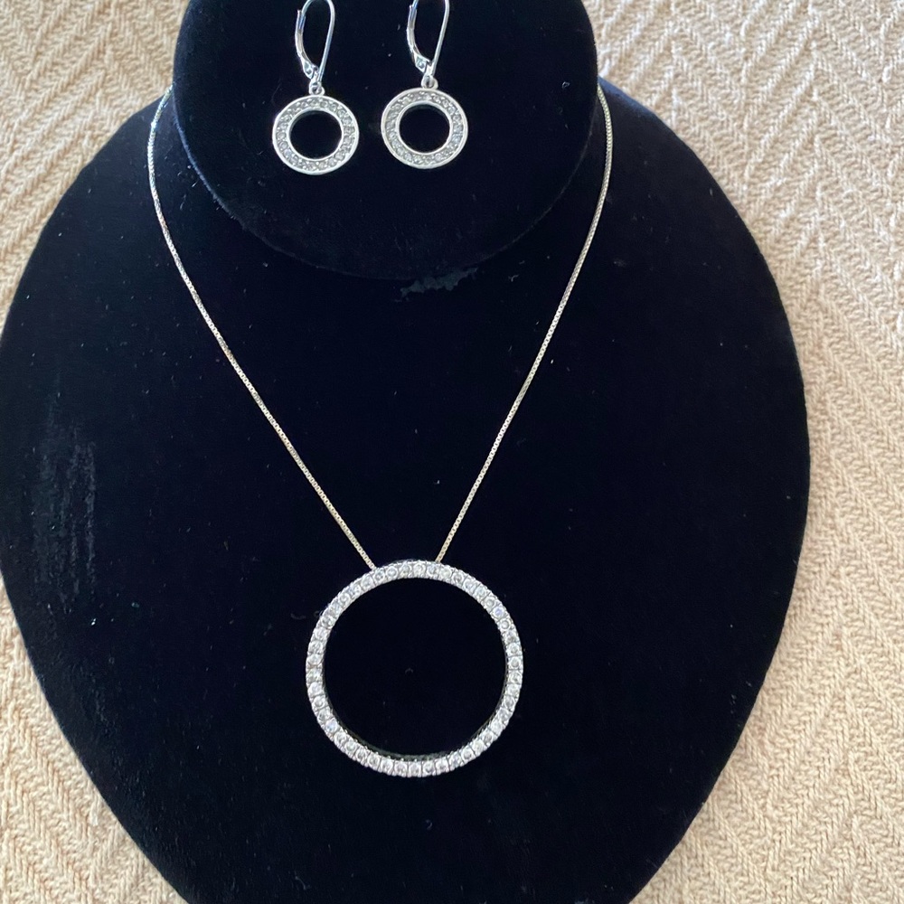 Diamond Circle Necklace 18 inch sterling silver has the #925 with earrings